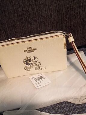 Coach Cream Disney Mickey Wristlet..2019 Edition